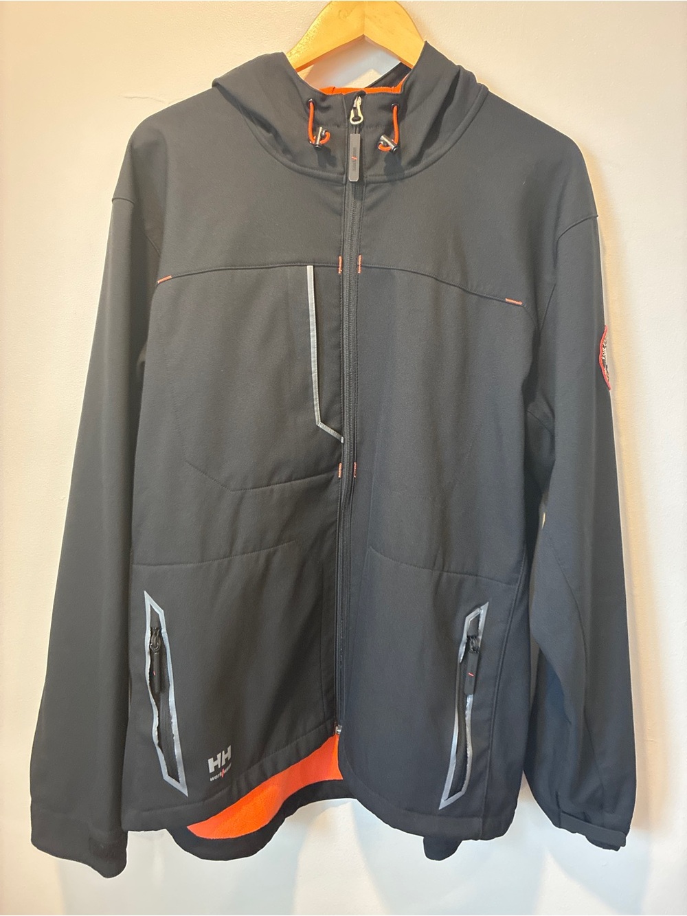 Helly Hansen Black Hooded Performance Jacket with Orange Accents
